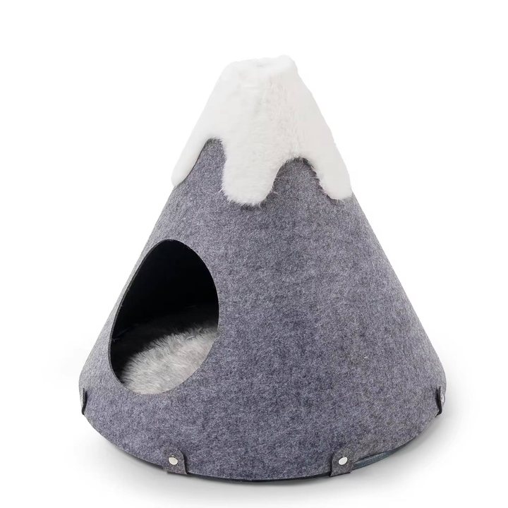 Grey felt cone-shaped cat house with a white plush peak and a round side entrance, styled like a snow-capped mountain.