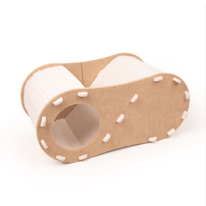 Tan and cream felt cat tunnel bed with a laced trim and two open oval ends.