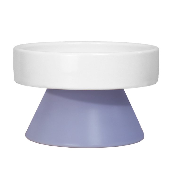 White ceramic pet bowl set on a lavender pedestal base