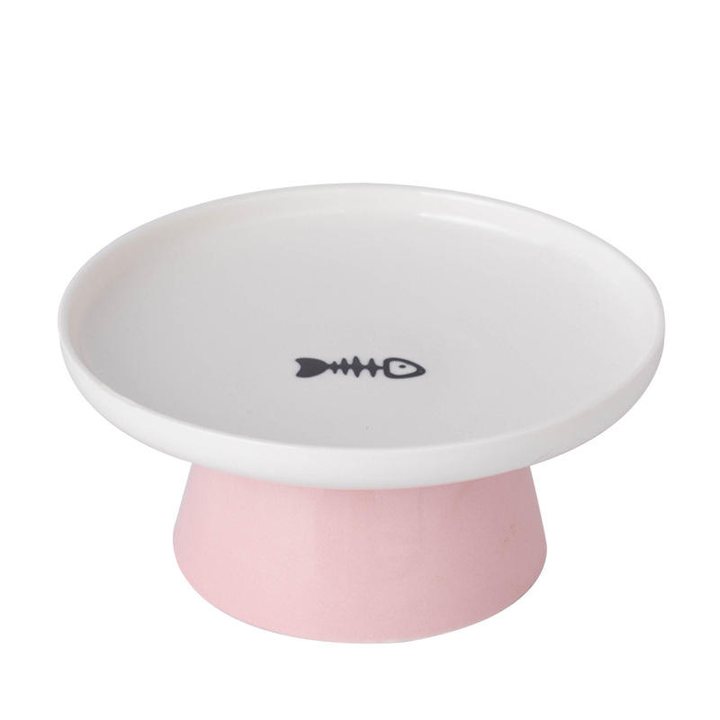 White ceramic pet bowl with a small fishbone icon, set on a pink pedestal base