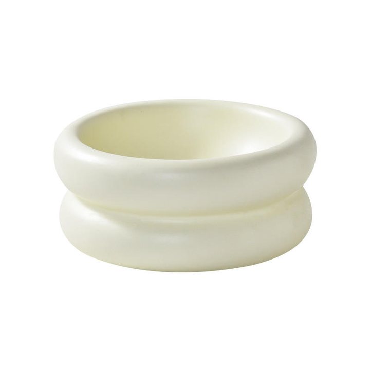 Double-ring ceramic pet bowl in a plain cream glaze.