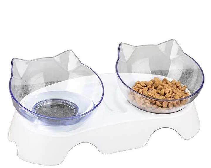 Double cat-ear-shaped transparent bowl set on a white raised stand, one bowl shown filled with kibble.