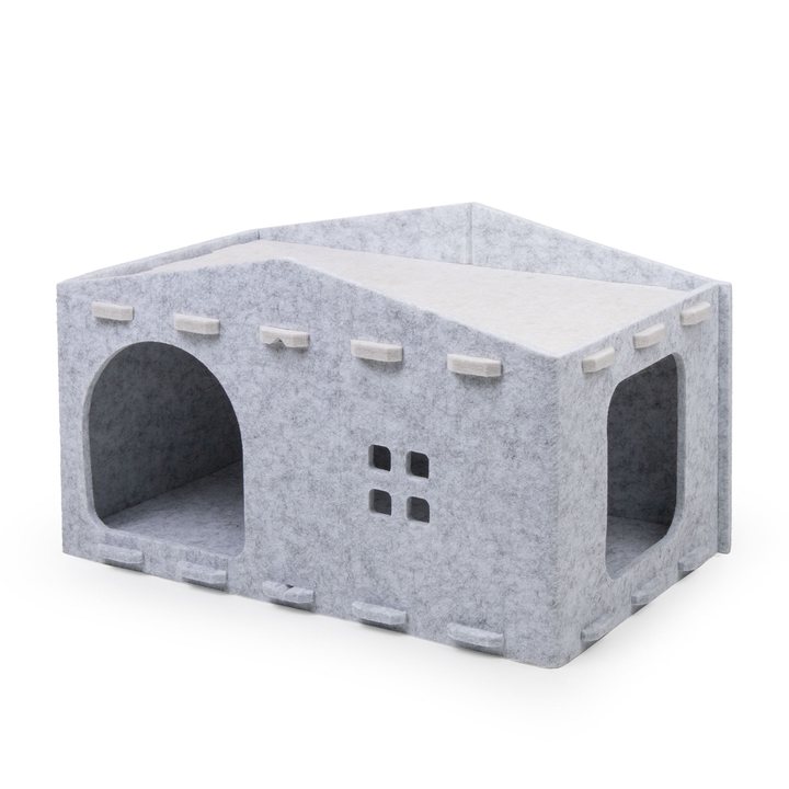 Grey and beige felt cottage-shaped folding cat house with a peaked roof and arched entrance.