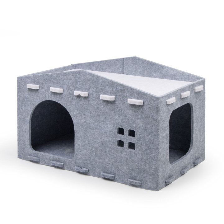 Grey felt cottage-shaped folding cat house with a peaked roof, window accents, and arched entrances.