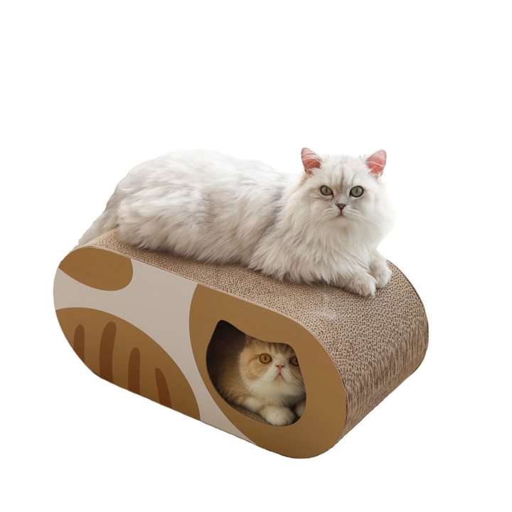 Oval capsule-shaped corrugated cardboard cat lounge in a tan and white patchwork print with a cat-face-shaped entrance cut-out.