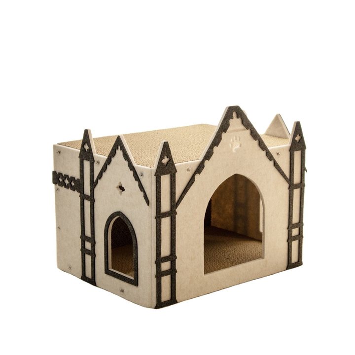 Cream felt gothic-castle-shaped cat house with dark grey trim, twin corner spires, and arched entrances.