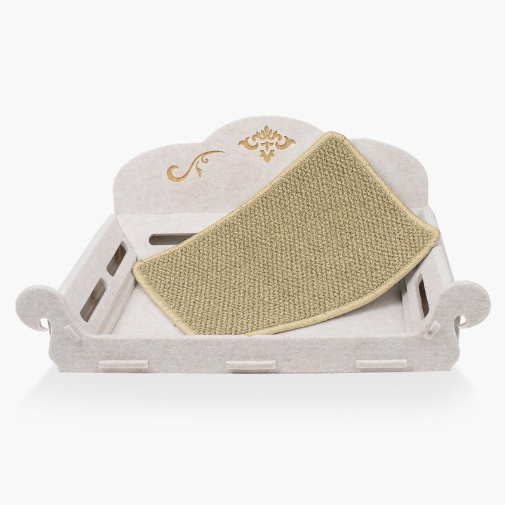 Cream felt cat scratcher lounger with a carved scalloped frame and a woven sisal scratch pad insert