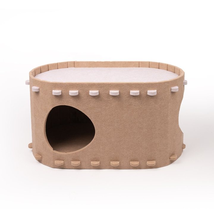 Oval felt cat house with a flat top deck for lounging and a round side entrance.
