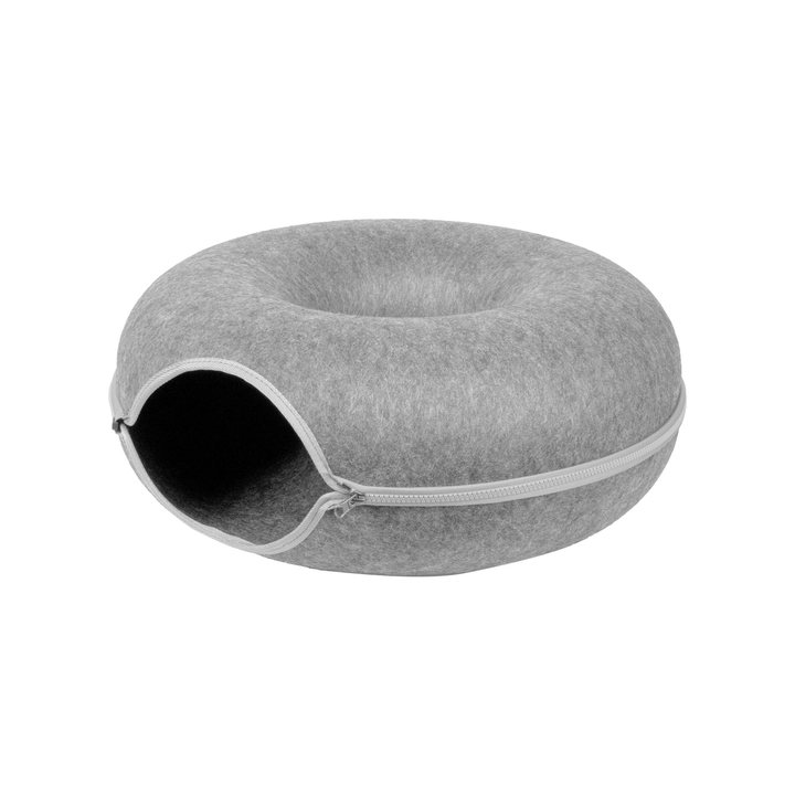 Light gray donut-shaped felt cat cave with a round zip-trimmed tunnel opening.