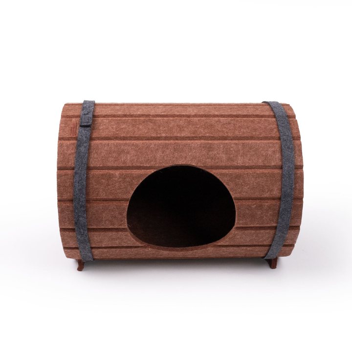 Barrel-shaped felt cat house with ribbed brown sides, dark gray hoop bands, and an oval entrance.