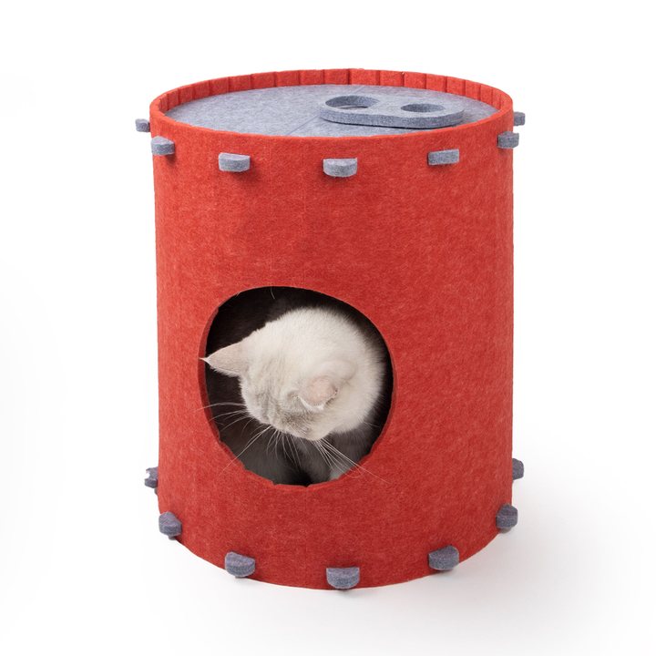 Cylindrical felt cat house in red with a gray pull-tab lid and a round entrance, cat peeking out.