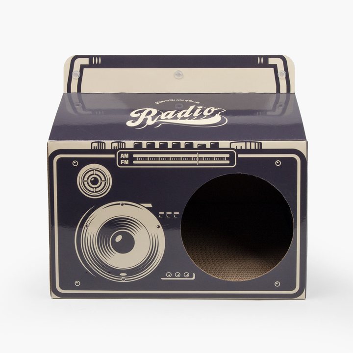 Cardboard cat scratcher house printed with a retro radio design and a round entrance hole