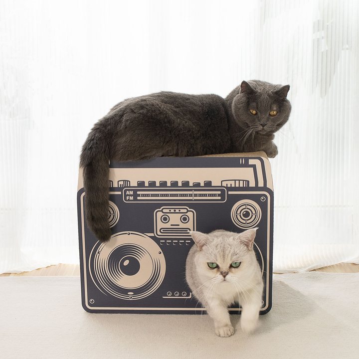 Cardboard cat scratcher house printed with a retro radio design