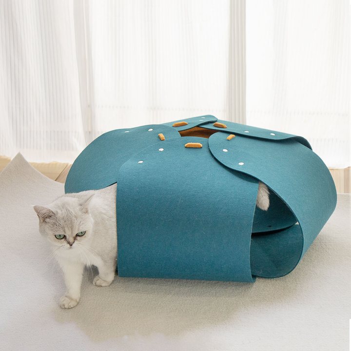 Teal wrapped felt cat tunnel with snap fasteners and open oval ends.