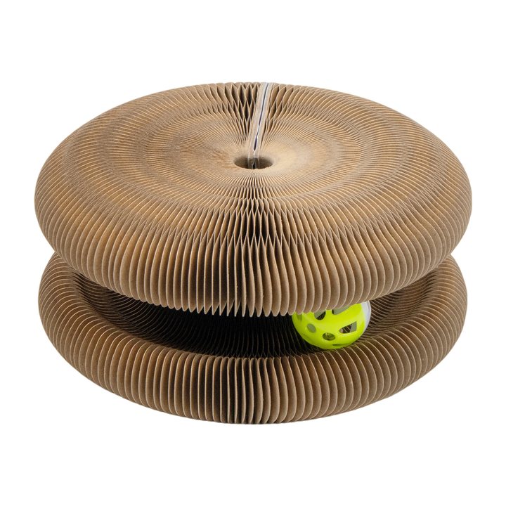 Folded kraft-paper honeycomb cat tunnel toy with a small perforated ball tucked inside