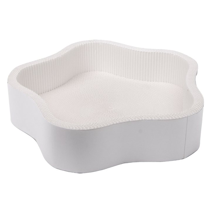 White cloud-shaped corrugated cardboard cat scratcher nest with a scalloped rim.