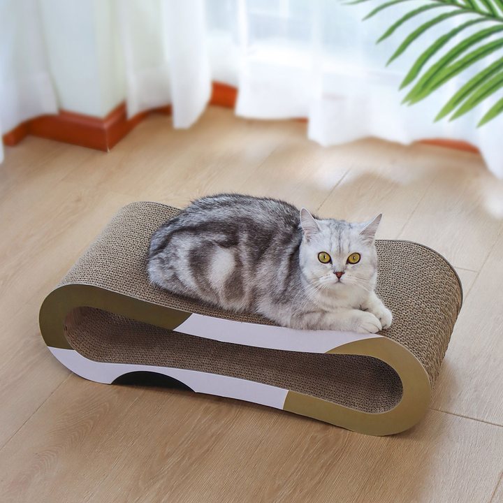 S-curve corrugated cardboard cat scratcher lounge in an olive, white and black camouflage print