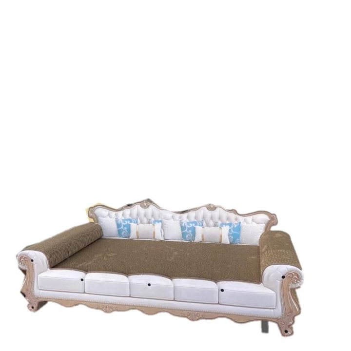 Baroque-style miniature sofa lounge with a carved white and gold frame and patterned cushions