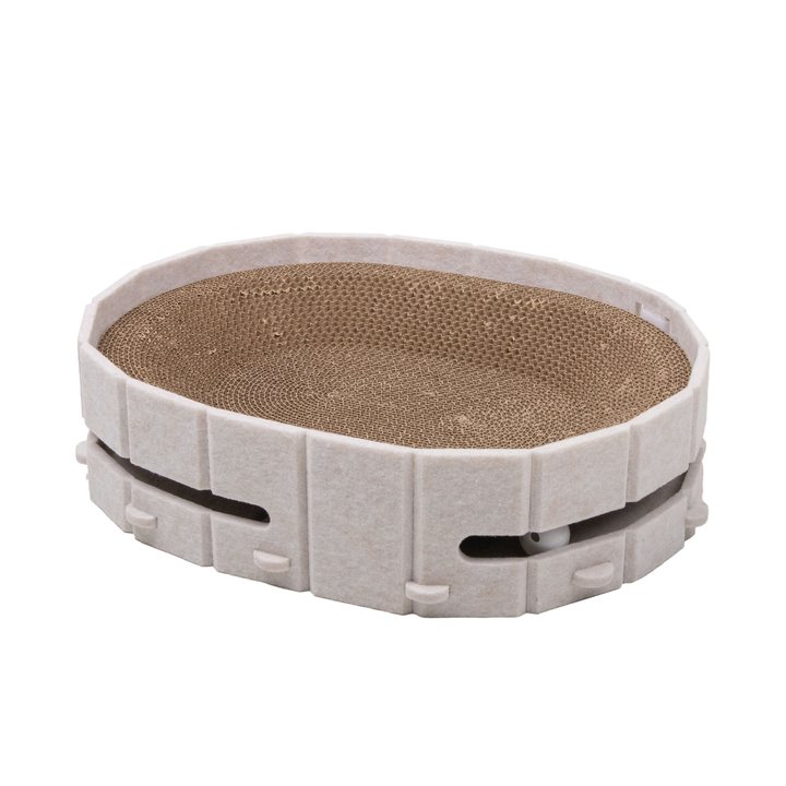 Oval cat scratcher nest with a cream felt rim, corrugated cardboard base, and a built-in ball-track slot