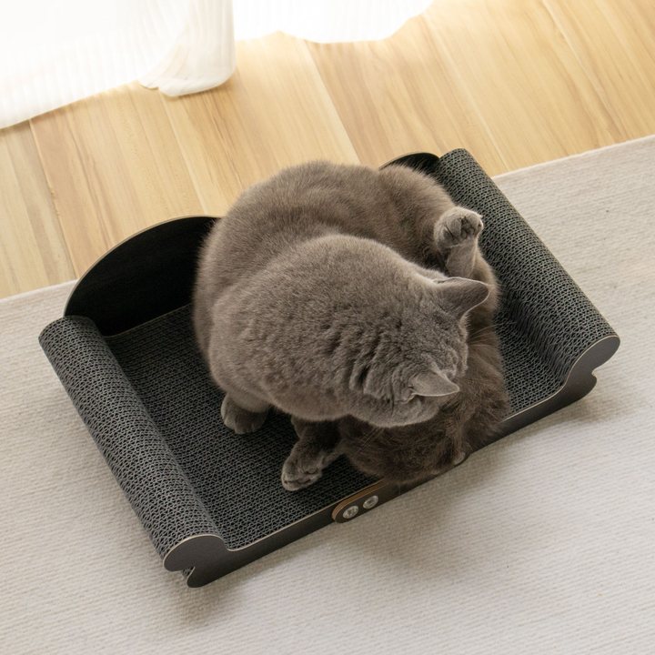 Dark grey rectangular cardboard cat scratch pad set in a low tray frame