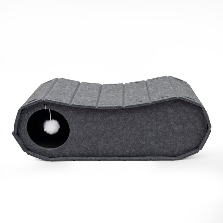 Gray felt cat tunnel lounge with a hanging pompom ball toy at one end