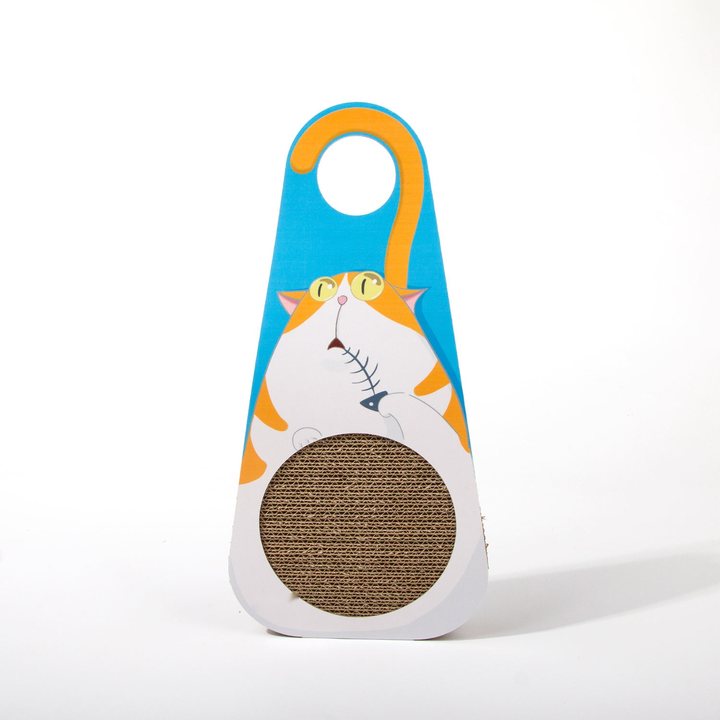 A cat-shaped cardboard door-hanger scratcher: a light blue hanger silhouette with an orange cat illustration (holding a fish-bone toy) above a round corrugated-cardboard scratch pad set into a white base, standing upright against a plain white background.