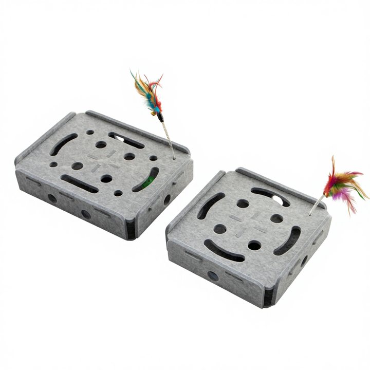 Grey felt cat puzzle box with cut-out holes, paired with a feather wand toy.