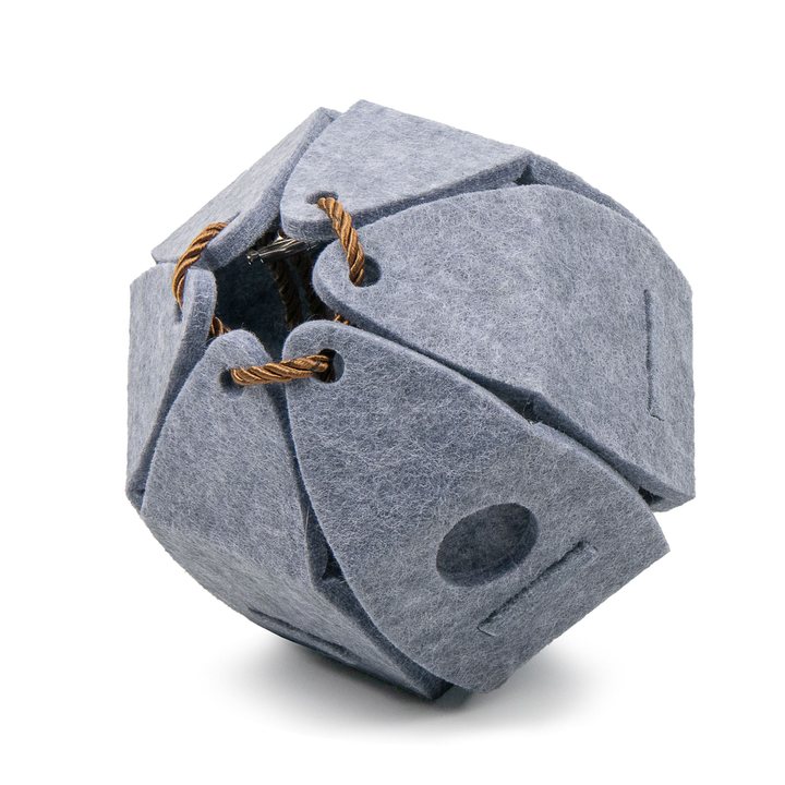 Faceted grey felt ball cat toy with rope-laced seams.