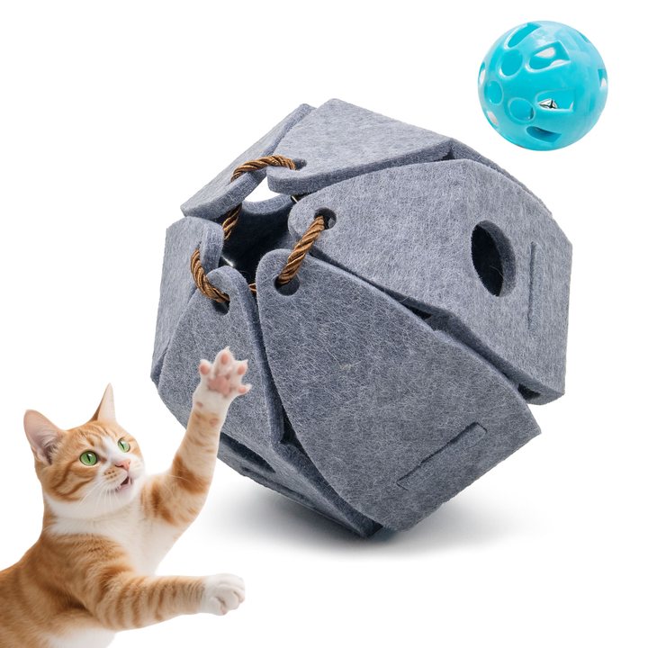 Faceted grey felt ball cat toy with rope-laced seams, shown with a small rattle ball.